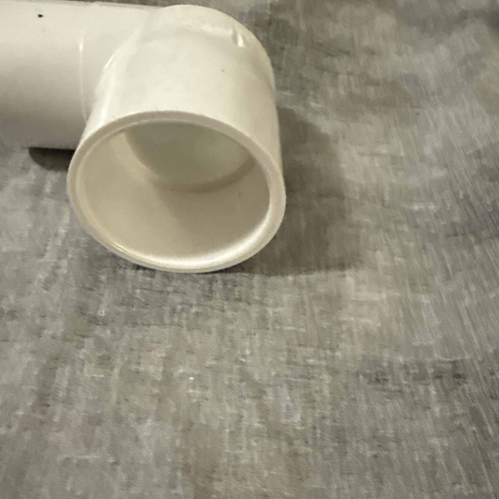 1 1/2" Charlotte 409-015 PVC 2304 Series 90° Street Elbow, SPG x Sfc